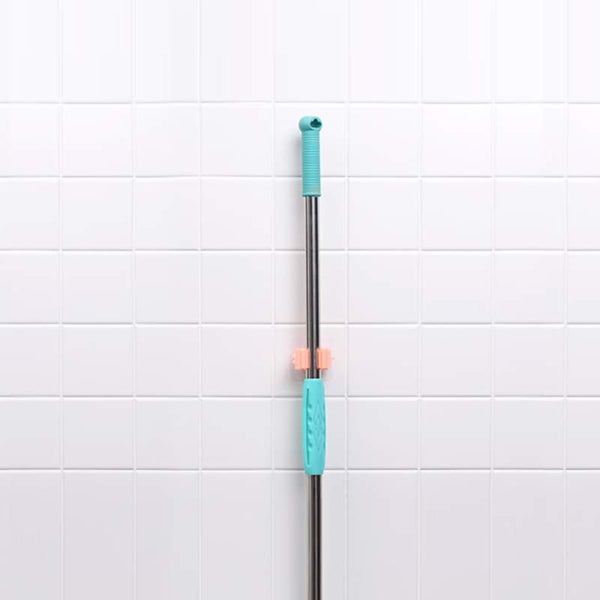Wall mounted brush holder