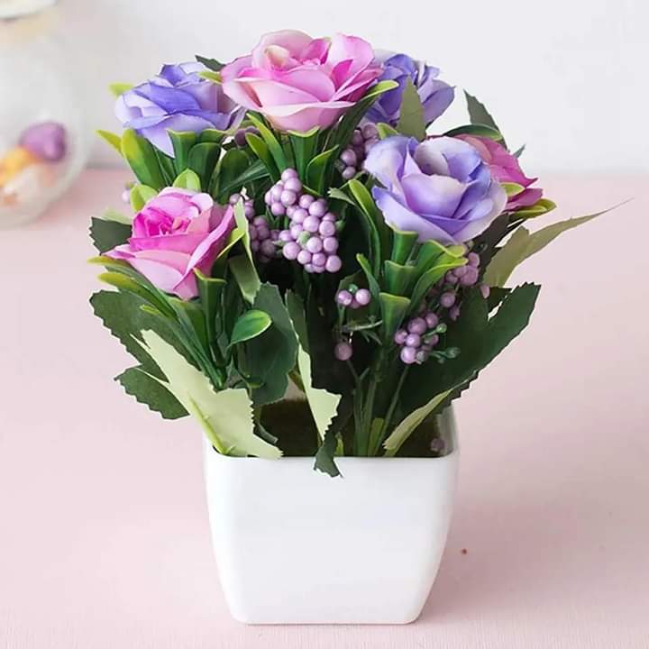 Beautiful flower pot with flower arrangement