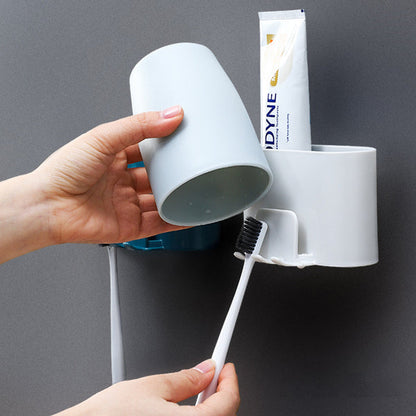 Wall mounted bathroom organizer for tooth paste and tooth brush