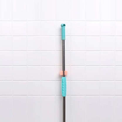 Wall mounted brush holder
