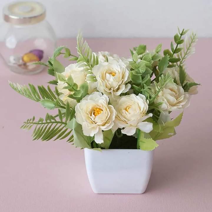 Beautiful flower pot with flower arrangement