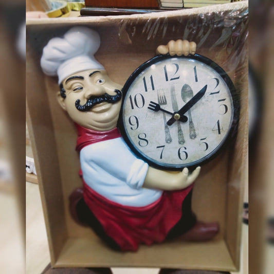 Chef kitchen wall clock in hand